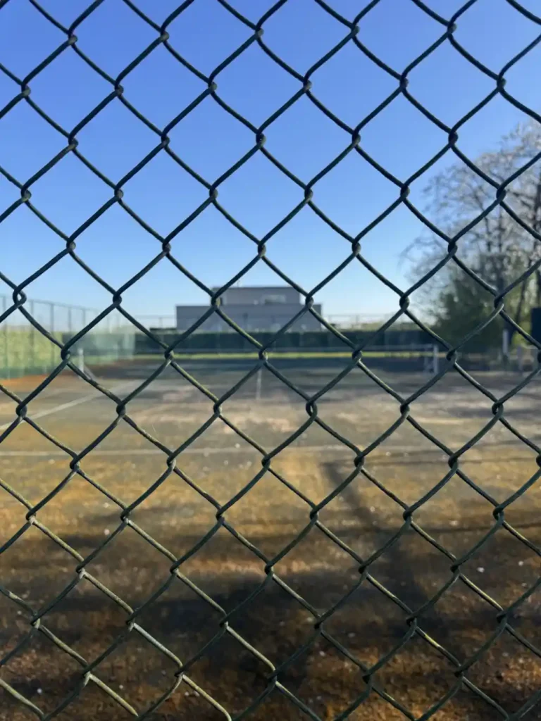 Tennisbaan reinigen